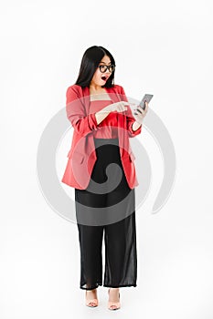 Asian woman in casual dress hold smartphone in her hand