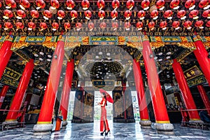 Asian woman in chinese dress traditional at Sanfeng Temple in Kaohsiung, Taiwan. photo