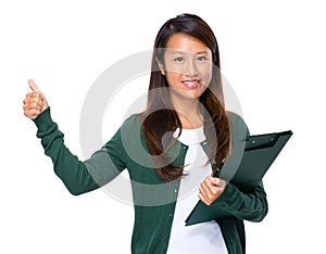 Asian woman with clipboard and thumb up