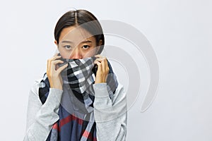 Asian woman cold flu raised hands from headache and toothache with fever sick from covid 19 virus in checkered scarf on