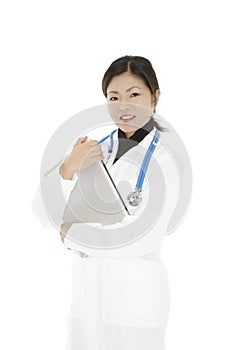 Asian woman doctor or nurse wearing a lab coat and holding a laptop computer