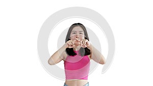 Asian woman doing silent gesture with finger