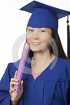 Asian woman wearing blue graduation holding pencil isolated whi