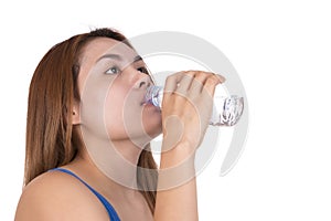 Asian woman drinking bottled water.