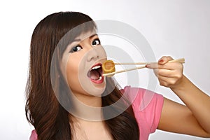Asian Woman Eating Japanese Food