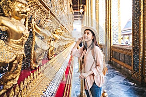 Asian woman enjoy sightseeing while travel in Thailand