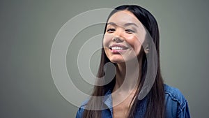 Asian woman enjoying perfect smile after teeth whitening dental care stomatology