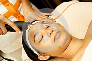 Asian Woman Face at Facial Treatment