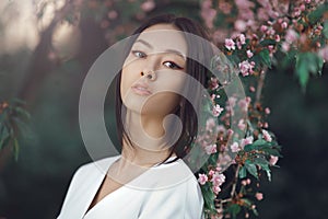 Asian woman fashion close-up portrait outdoors