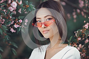 Asian woman fashion close-up portrait outdoors