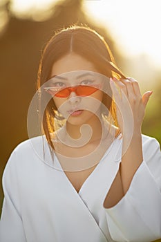 Asian woman fashion close-up portrait outdoors