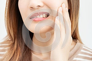 Asian woman feel toothache from gingivitis, female suffer tooth, decay problems, dental care. sensitive tooth, decay problem, bad