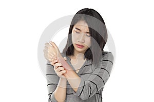 Asian woman feel wrist bones injury