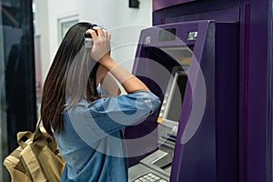 Asian woman feeling stressed She couldn't remember the ATM password