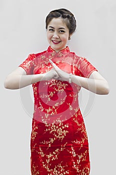 Asian woman with gesture of congratulation