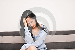 An asian woman getting anxiety and depression