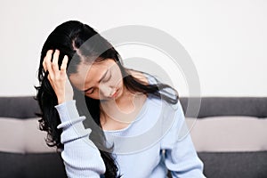 An asian woman getting anxiety and depression