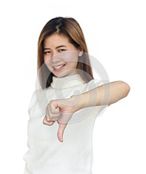 Asian woman giving her thumbs down.