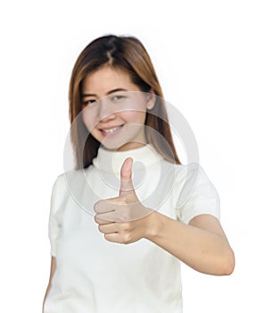 Asian woman giving her thumbs up.