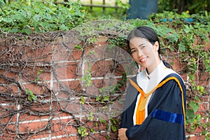 Asian woman in Graduate dress