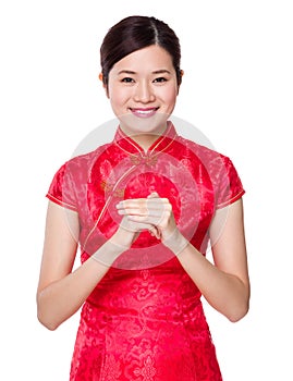 Asian woman with hand congratulation gesture