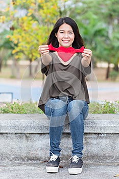Asian woman hand hold beautiful red heart sweet loving symbol