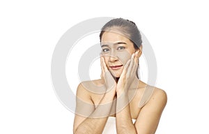 Asian woman with hand touching face