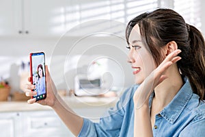 Asian woman has video chat