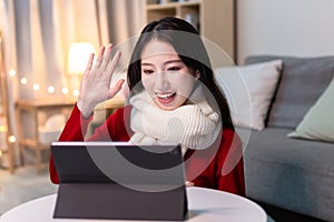 Asian woman has video chat