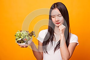 Asian woman hate salad.