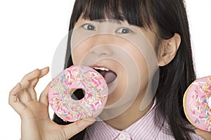 Asian woman having some fun with delicious strawberry frosted do