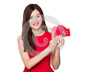 Asian woman hold with lucky money