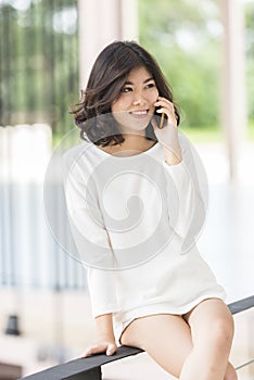 Asian woman hold mobile