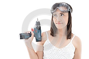 Asian woman holding drill on white background