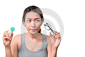 Asian woman holding glasses and contact lens on isolate on white background with clipping path, Selective focus on glasses ,