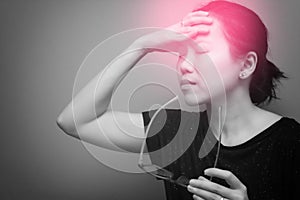 Asian woman holding glasses, suffer from having a strong headache and fever, poor sight, farsightedness, myopia. black & white