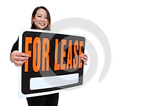 Asian Woman Holding Lease Sign