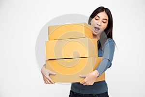 Asian woman holding package parcel box, Delivery courier and shipment service concept