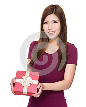 Asian woman holding present box