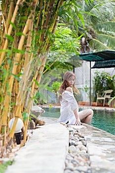 Asian Woman In Hotel Swimming Pool Relaxing Vacation Travel, Young Girl Enjoying Spa