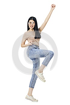 Asian woman jumping celebrating success