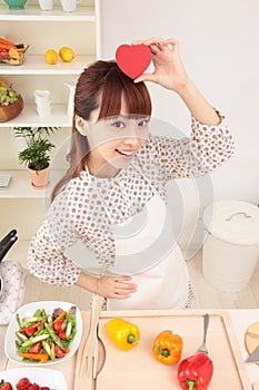 Asian woman in kitchen