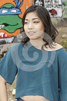 Asian Woman in lifestyle locations by Public Grafitti Wall