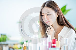 Woman with acne problem