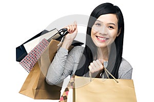 Asian woman with lots of shopping bag