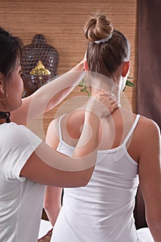 Asian woman making massage