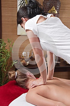 Asian woman making massage to a patient