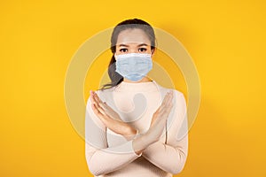 Asian woman in medical face mask to protect Covid-19 (Coronavirus)