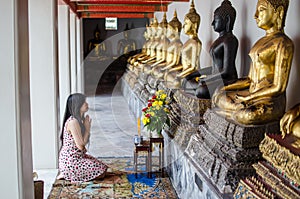 Asian woman meditation pray buddha