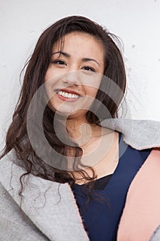 Asian woman outdoor smiling to camera